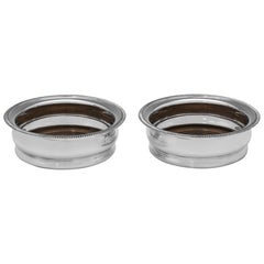 Pair of mid century sterling silver wine coasters made in 1968 by C. J. Vander
