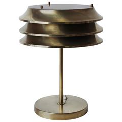 Lampada in ottone di Kari Ruokonen