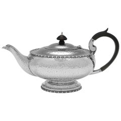 Antique Arts and crafts design sterling silver teapot made in 1928 by Walker & Hall