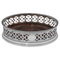 Posavasos de plata de ley de la época de Jorge III por Robert Hennell I en 1779