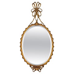 Mid-Century Hollywood Regency Italian Carved Giltwood Ribbon Mirror