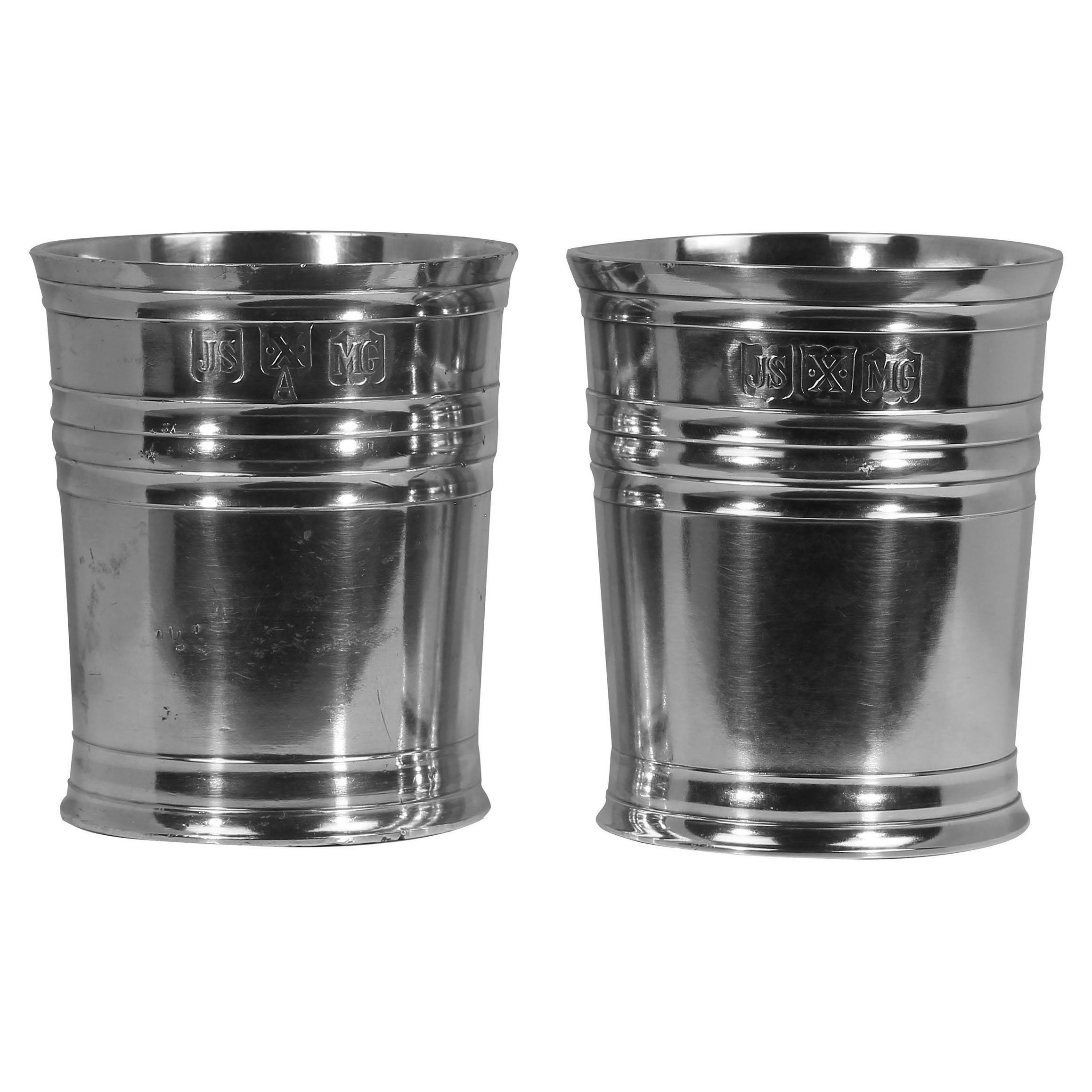 
John Somers Brazilian Pewter – Pair of 'Copo de Whisky'

Elevate your barware collection with this elegant pair of Copo de Whisky cups, crafted by the celebrated Brazilian pewter artisan John Somers. Famed for his dedication to craftsmanship and