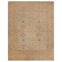 Antiquité Circa-1900 Tapis Oushak en laine surdimensionné à motifs floraux roses et jaunes