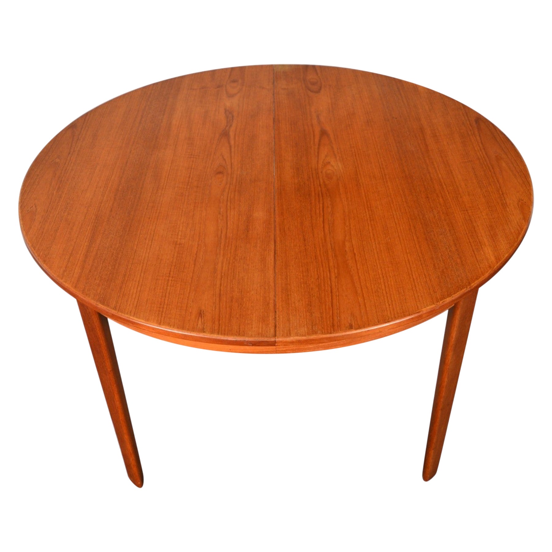 Round Danish Modern Expandable Teak Dining Table With Two Leaves
