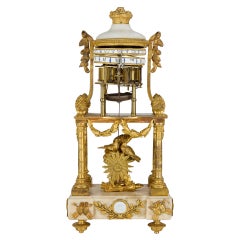Pendule de cheminée Louis XVI du 18e siècle en bronze doré et marbre tournant par Lepaute