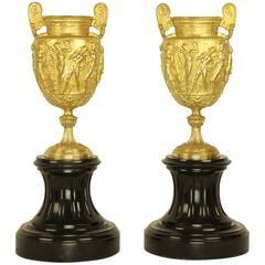 Pair of Charles X Gilt Bronze Urns on a Black Marble socle 4