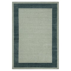 Rug & Kilim's Block Print Rug in Blue and Cream Floral Pattern, Navy Blue Border (Tapis à motifs floraux bleu et crème, bordure bleu marine)