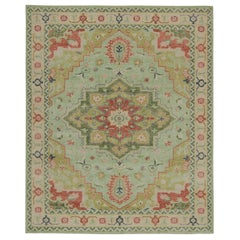 Rug & Kilim's Distressed Heriz Serapi Style Rug avec médaillon floral vert