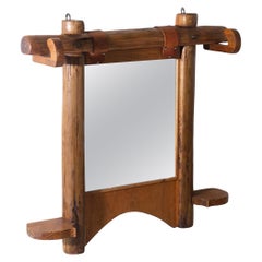 Majestic France wall mirror made of log wood and leather