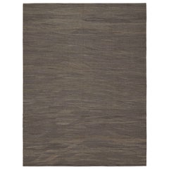 Alfombra contemporánea con textura en tonos beige-marrón y topo de Rug & Kilim