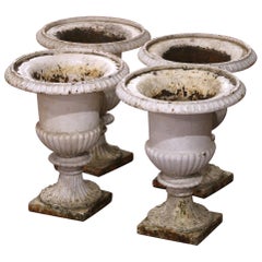Set of Four Mid-19th Century French Weathered Painted Iron Medici Vases