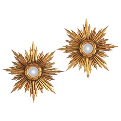 Paire de miroirs étoilés Sunburst en bois doré, petite taille, baroque espagnol
