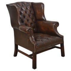 Leather upholstered wingback armchair