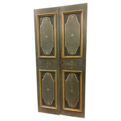 Lacquered and painted wooden double-leaf door, Italy