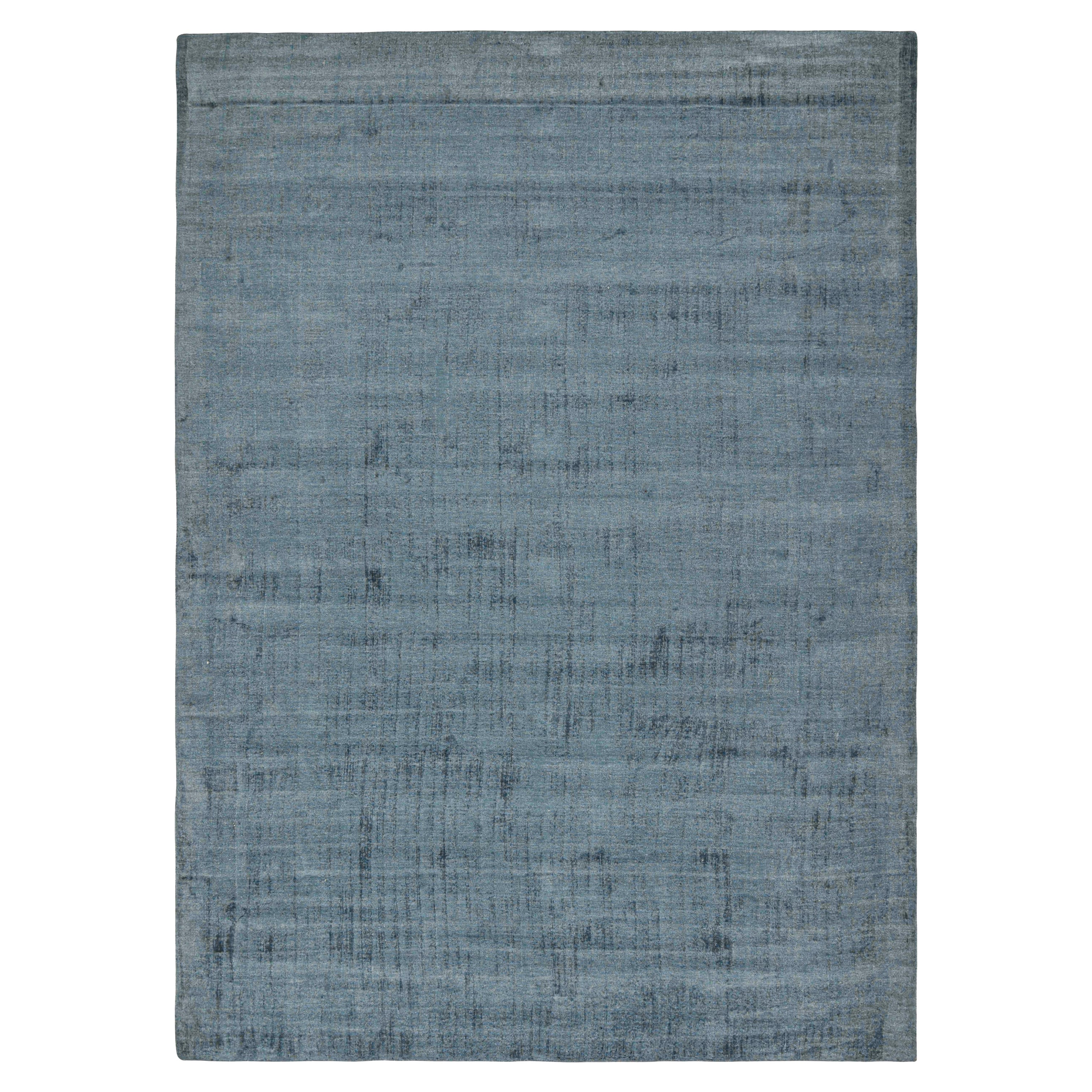 Tapis Modernity de Rug & Kilim en bleu uni à rayures ton sur ton