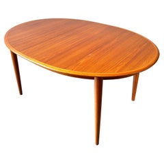 Used Danish teak mcm oval dining table with leaves