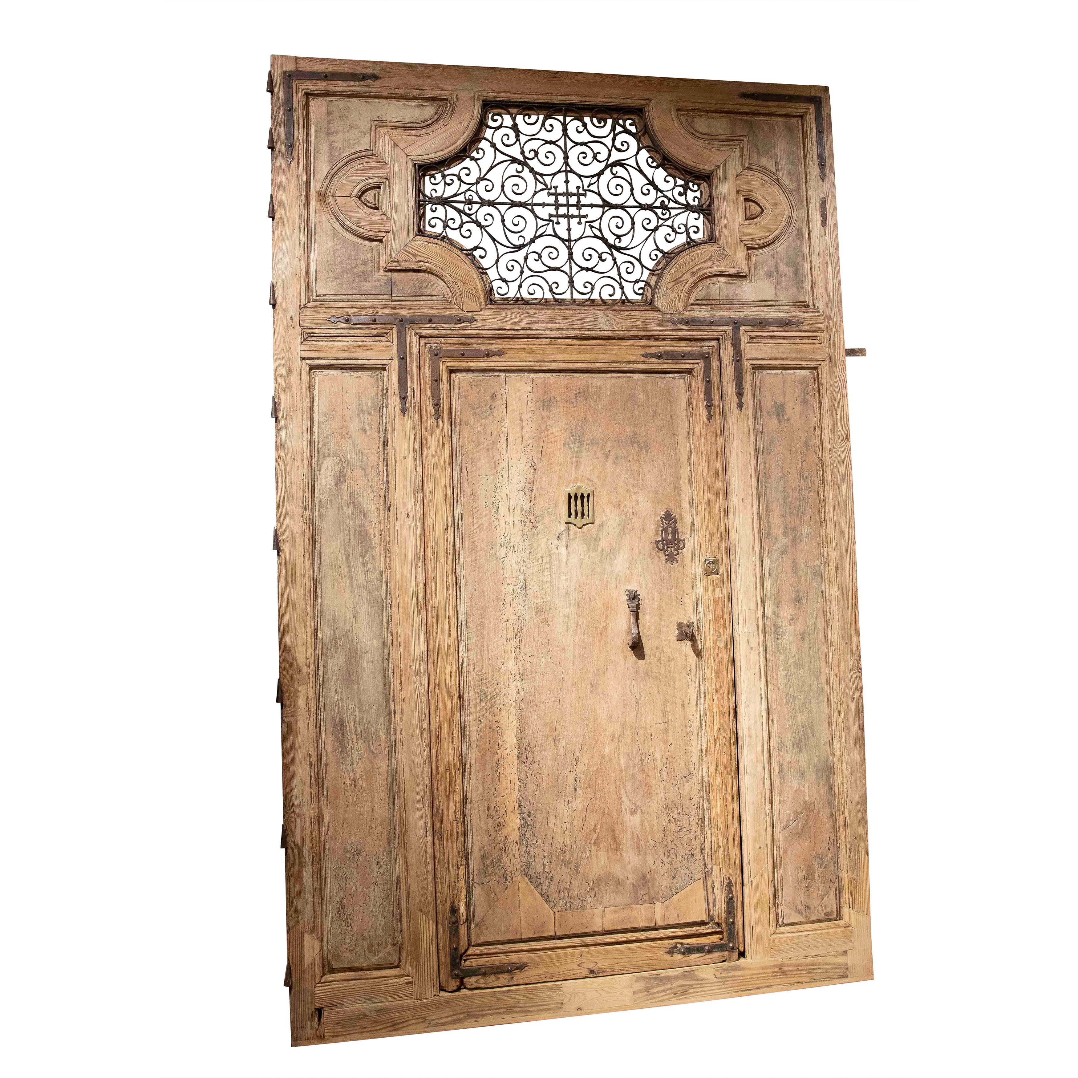 19th Antique Wooden Entrance Door with Wrought Iron Grille and Bronze Knockers For Sale