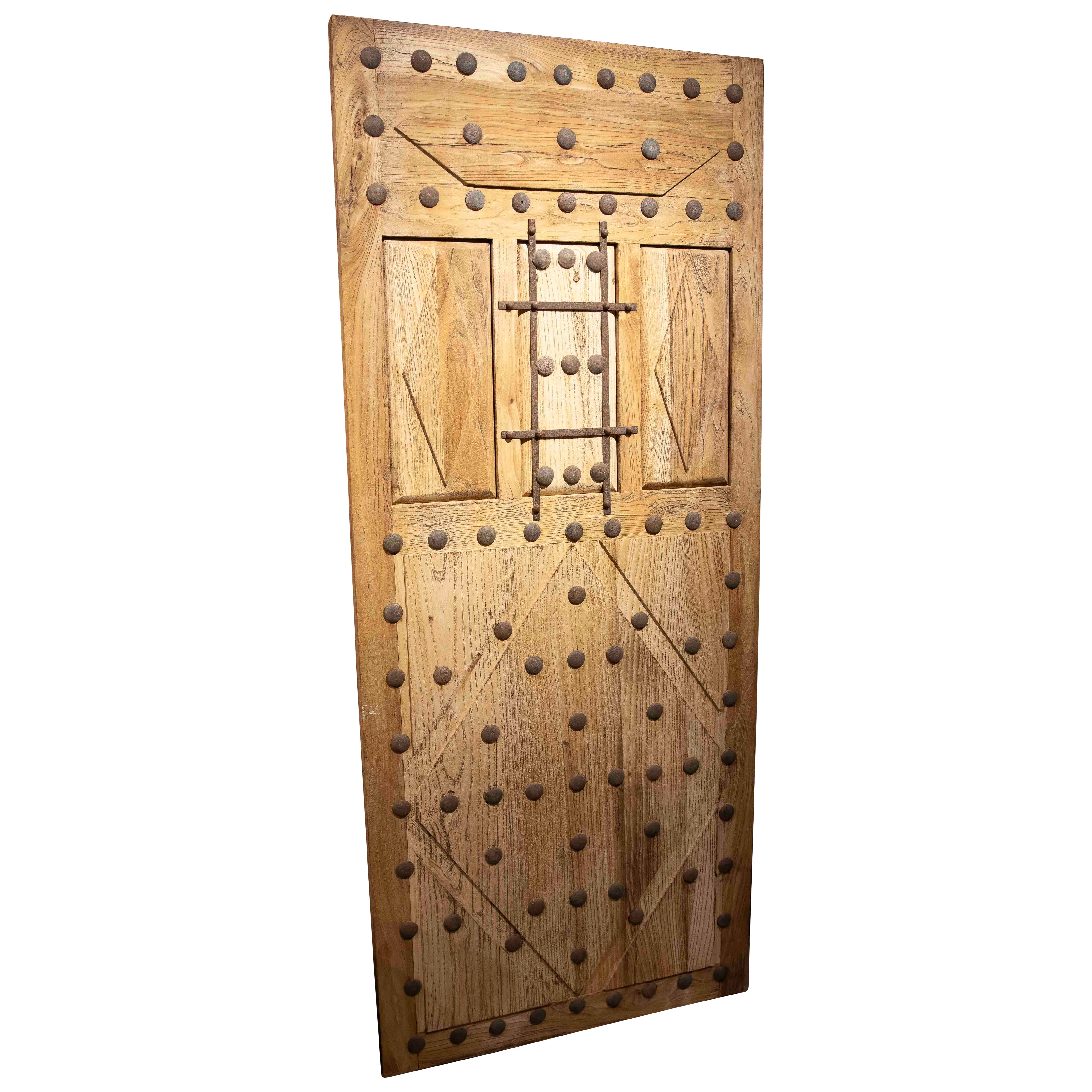 1980s Rustic Elm Wood Door with Nails and Decorative Grille For Sale