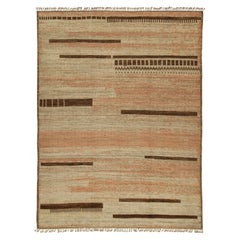 Alfombra de estilo marroquí de Rug & Kilim con motivos geométricos en beige, marrón y rosa