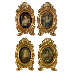 Quattro Cornici Portafoto Italiane Carlo XX in Legno Scolpito e Dorato Set di 4