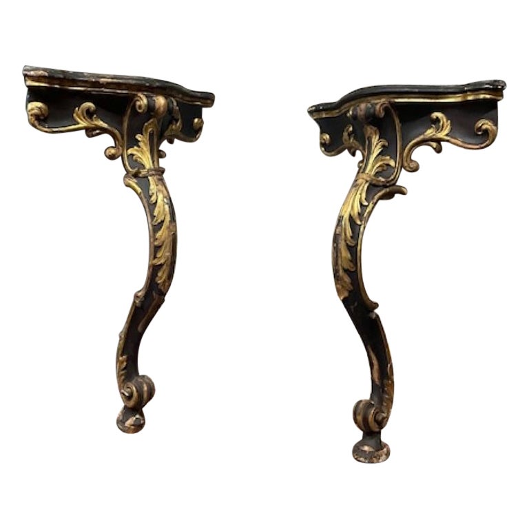 Pair of wooden consoles, corner shelves, lacquered with gold decorations, Italy in vendita