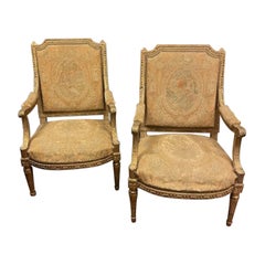 Pair of Louis XV armchairs in carved and gilded wood, France
