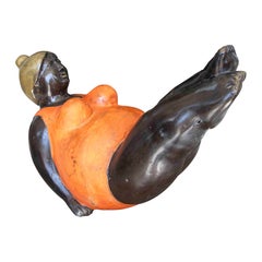 1990s Bronze Sculpture of a Reclining Woman in an Orange Swimsuit