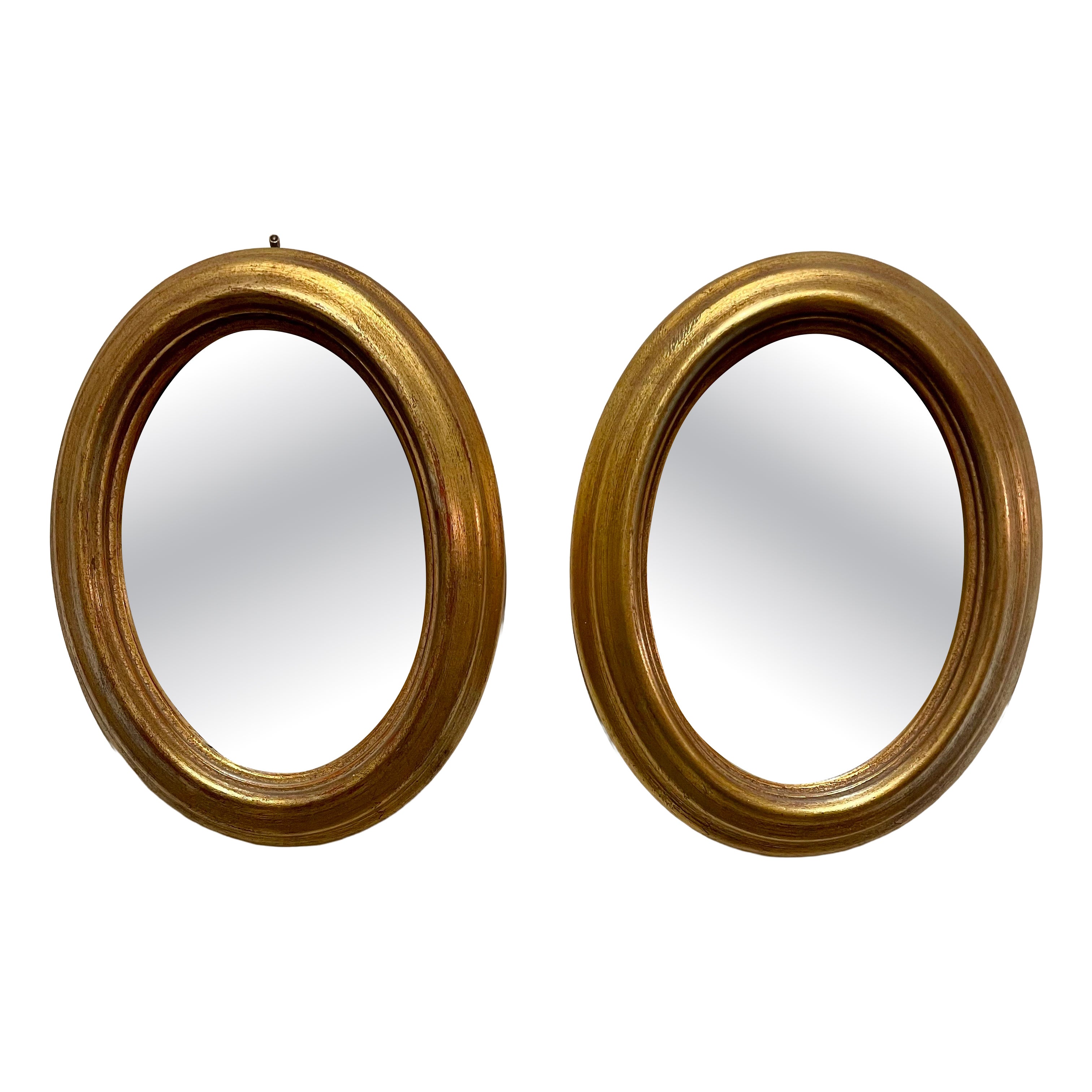 Pair of Vintage Gilt Oval Italian Mirrors
