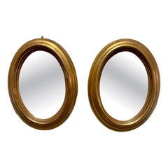 Pair of Vintage Gilt Oval Italian Mirrors