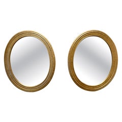 Pair of Vintage Gilt Oval Mirrors