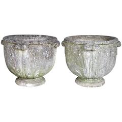 Pair of English Neoclassical Style Cast Stone Urns with Acanthus Leaf Handles