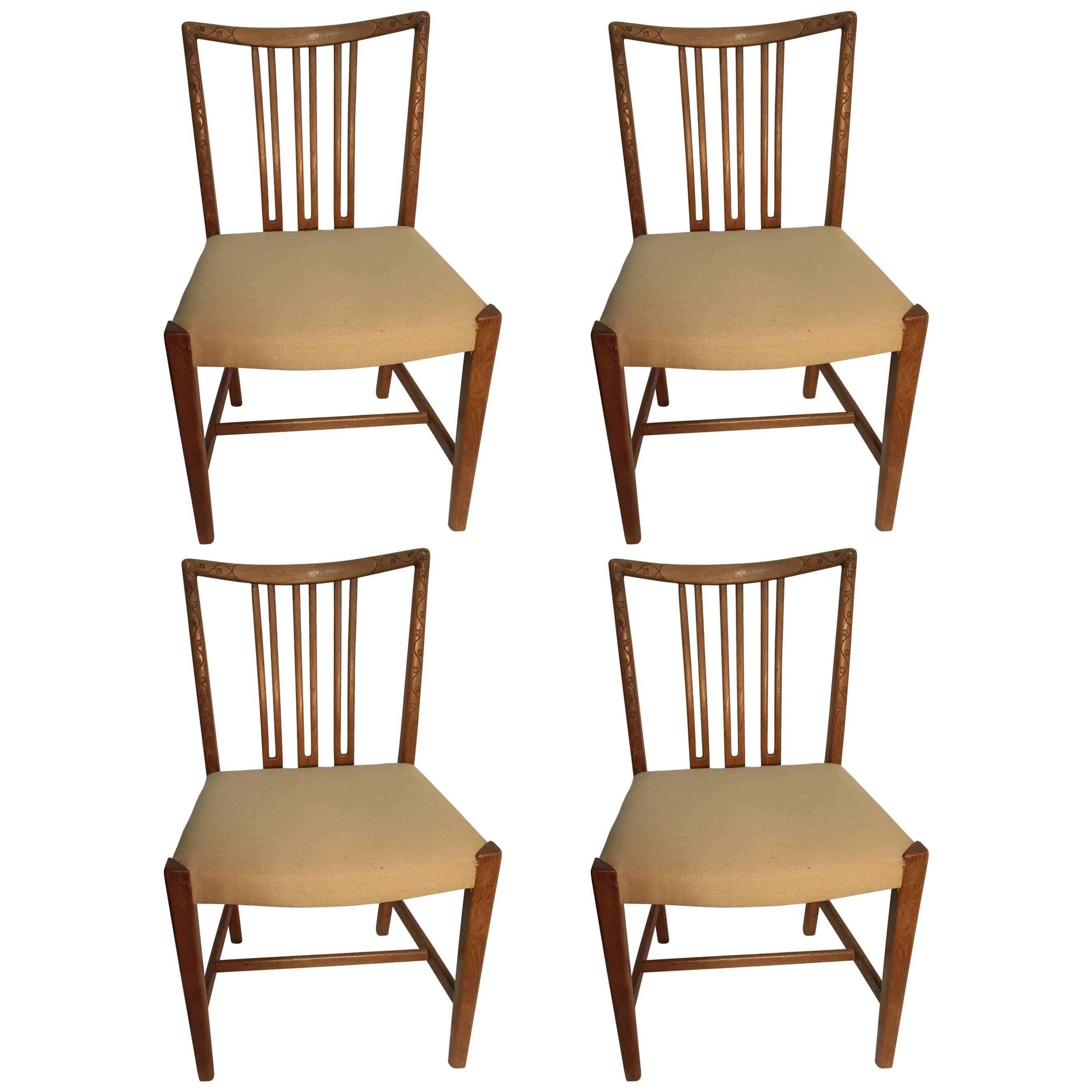 Four Hans Wegner Dining Chairs