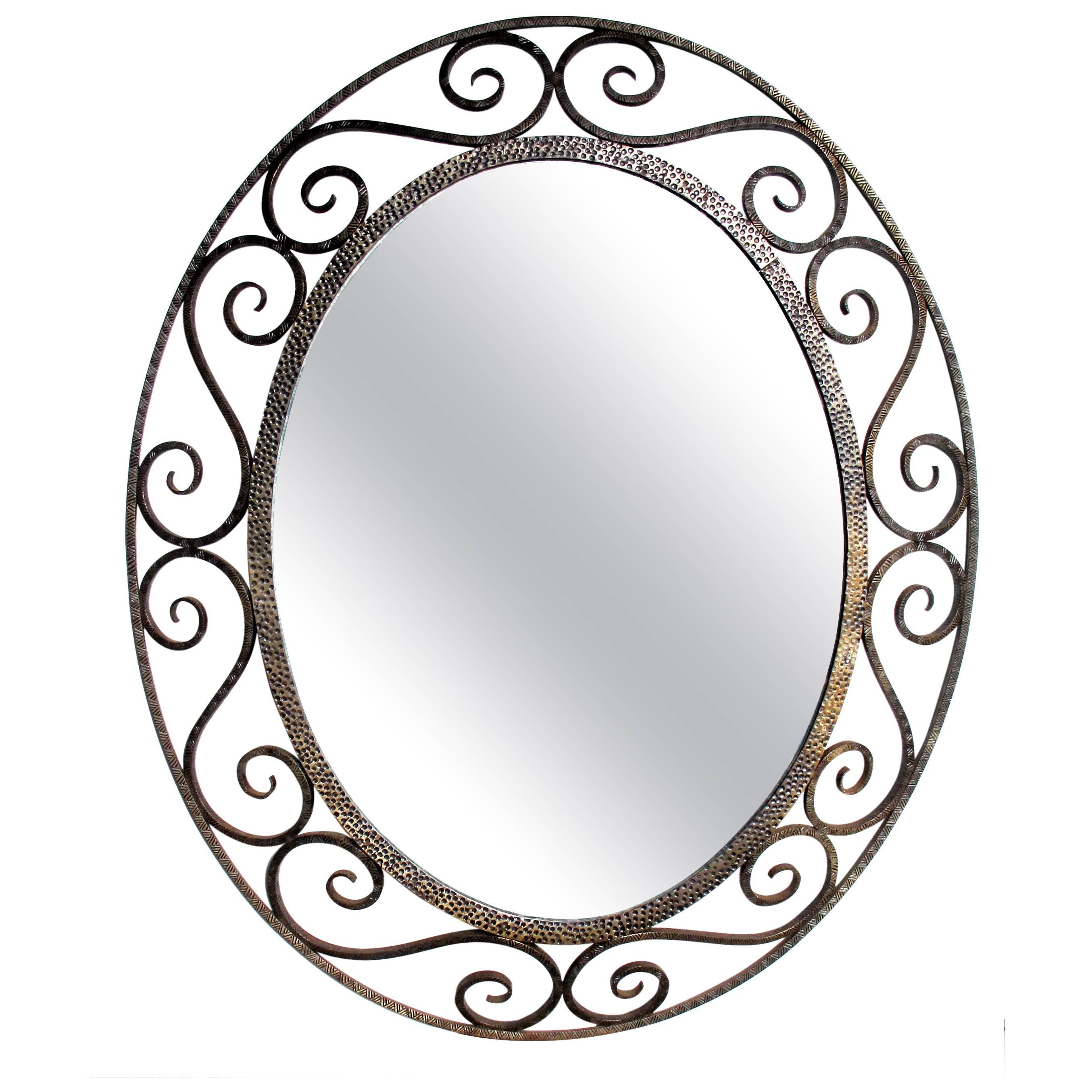 A French Art Deco Openwork Iron Oval Mirror in the Style of Edgar Brandt For Sale