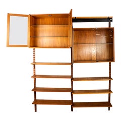 A Danish modular teak shelf by Poul Cadovius for Cado 1960.