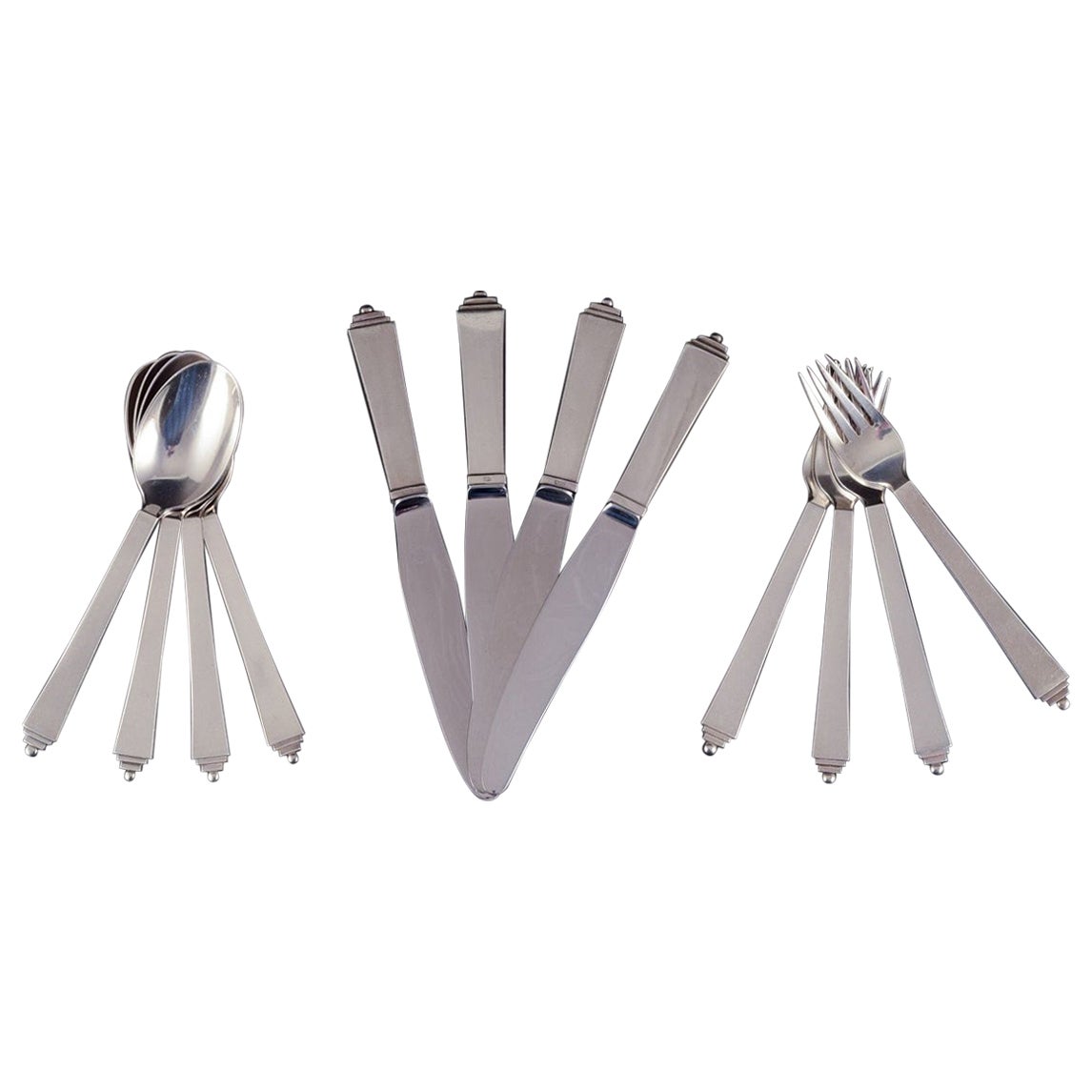 Georg Jensen Pyramid. Complete dinner service for four people.