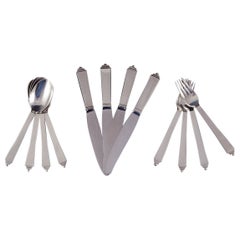 Georg Jensen Pyramid. Complete dinner service for four people.