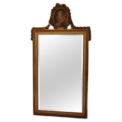 Large 19th Century giltwood wall mirror with painted panel of Marie Antoinettea
