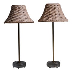 Swedish designer glass, brass and rattan table lamps by EAE, 1960s