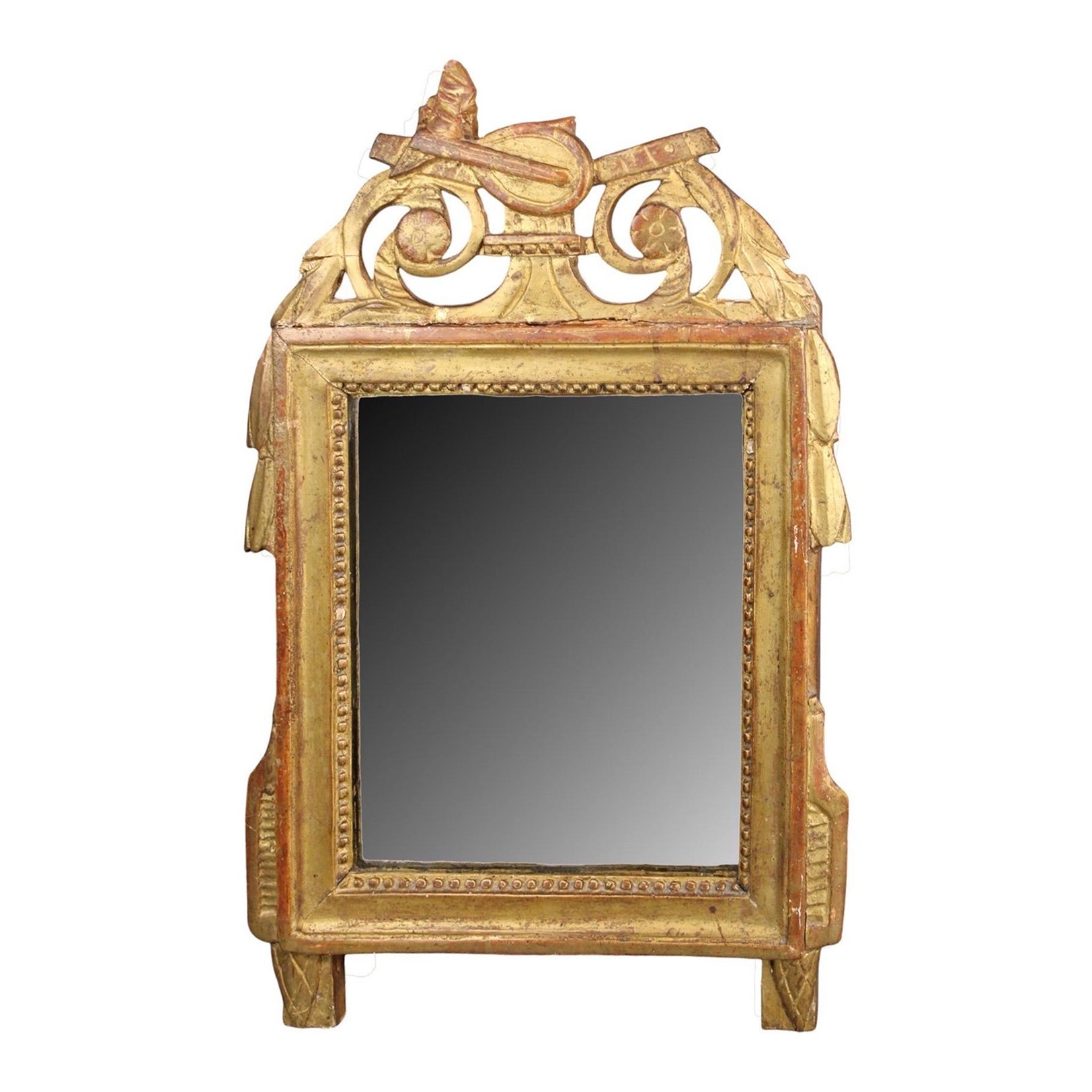 Miroir de style Louis XVI encadré de feuilles d'or, 19e siècle, avec écusson à thème musical en vente
