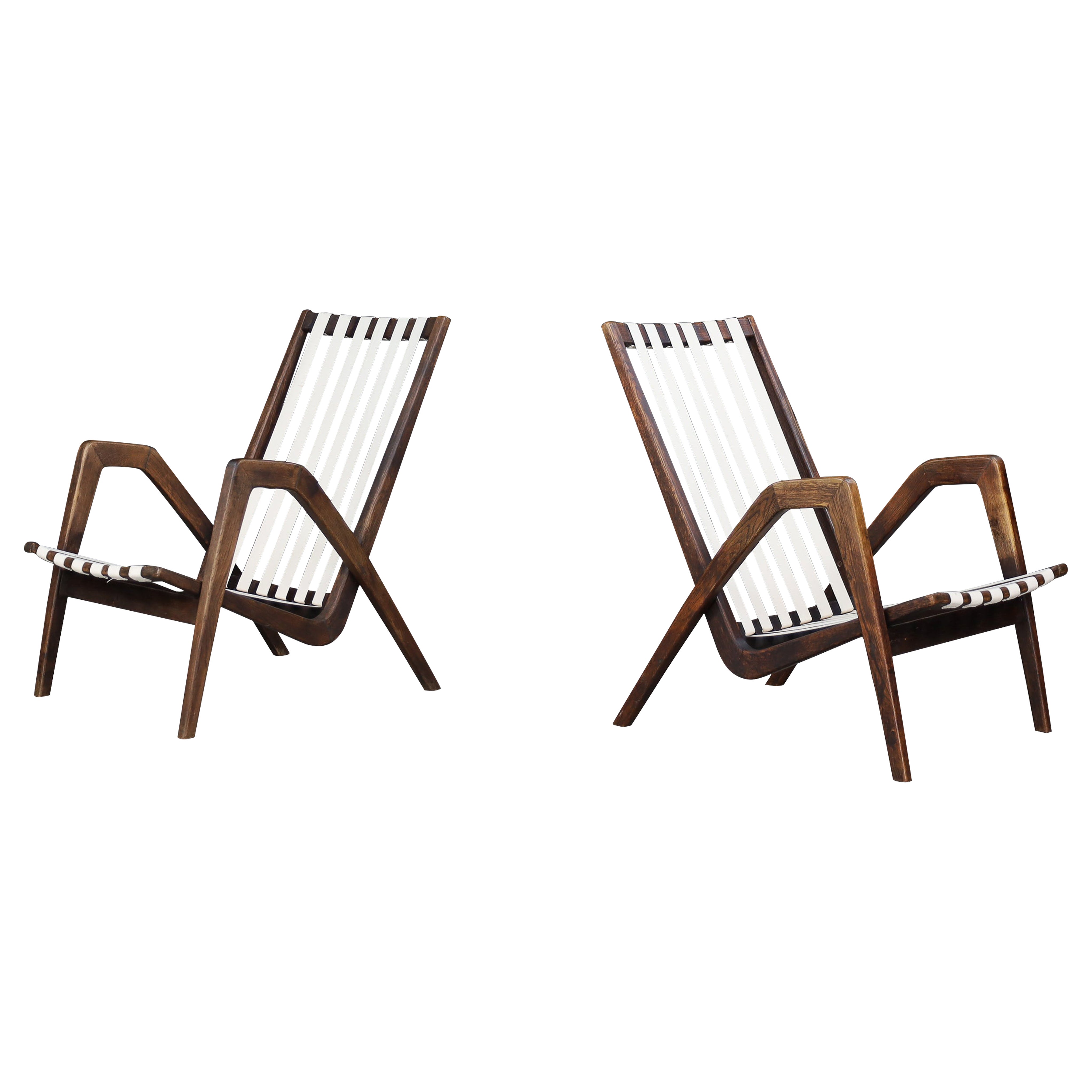 Rare Pair of Jan Vaněk Sculptural Oak Lounge Chairs, 1940s Czech Modernism
