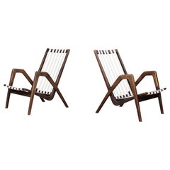 Rare Pair of Jan Vaněk Sculptural Oak Lounge Chairs, 1940s Czech Modernism