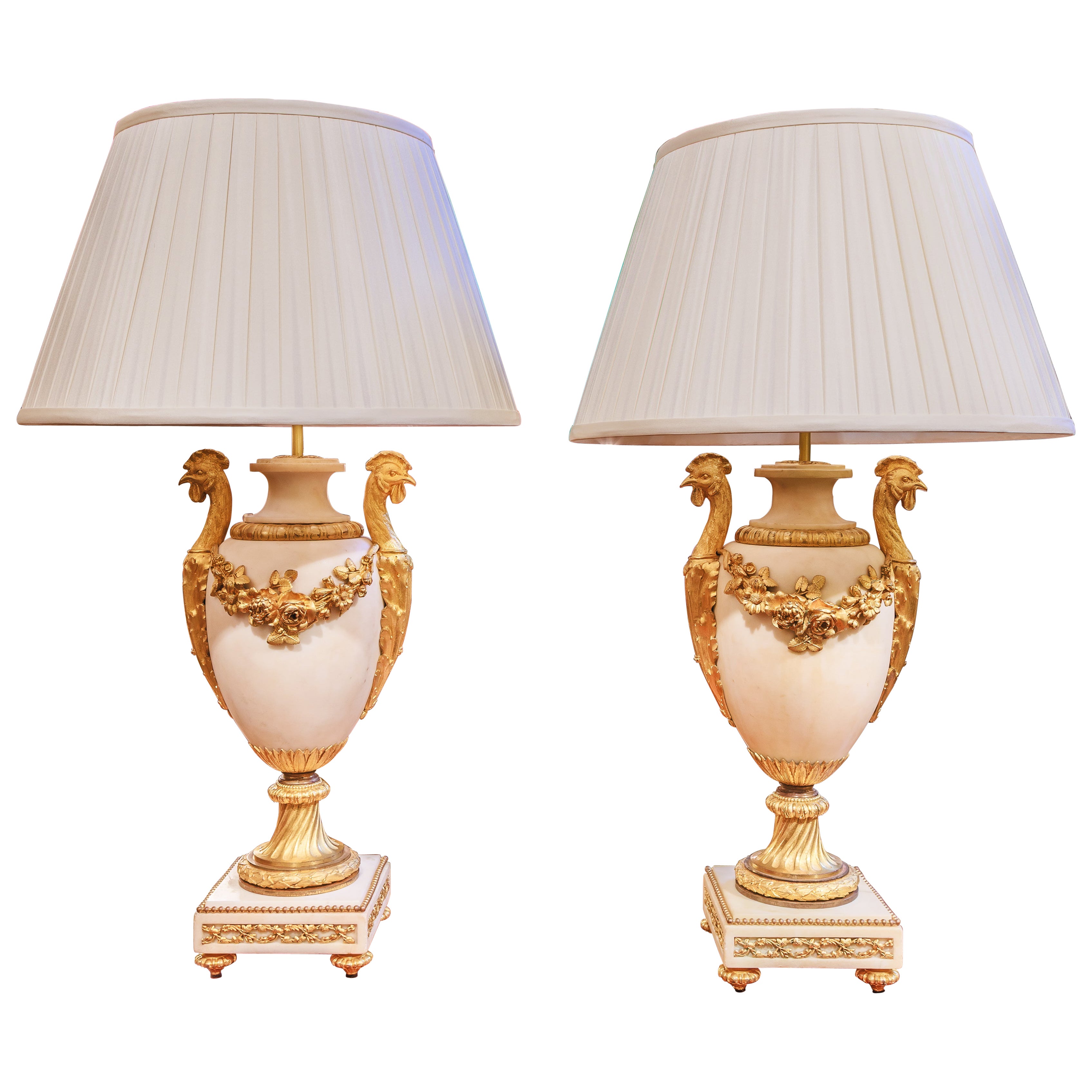 A fine pair of 19th c French Louis XVI Carrera marble and gilt bronze urn lamps
