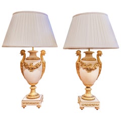 A fine pair of 19th c French Louis XVI Carrera marble and gilt bronze urn lamps