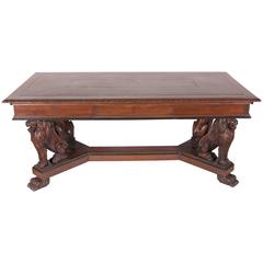 Antique Continental Walnut Desk with Carved Lion Legs and Green Leather Inset