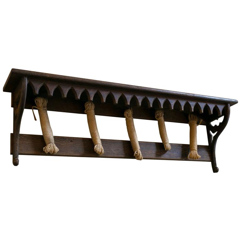 Gothic-Style English Wooden Wall Shelf with Hooks, circa 1890 For Sale