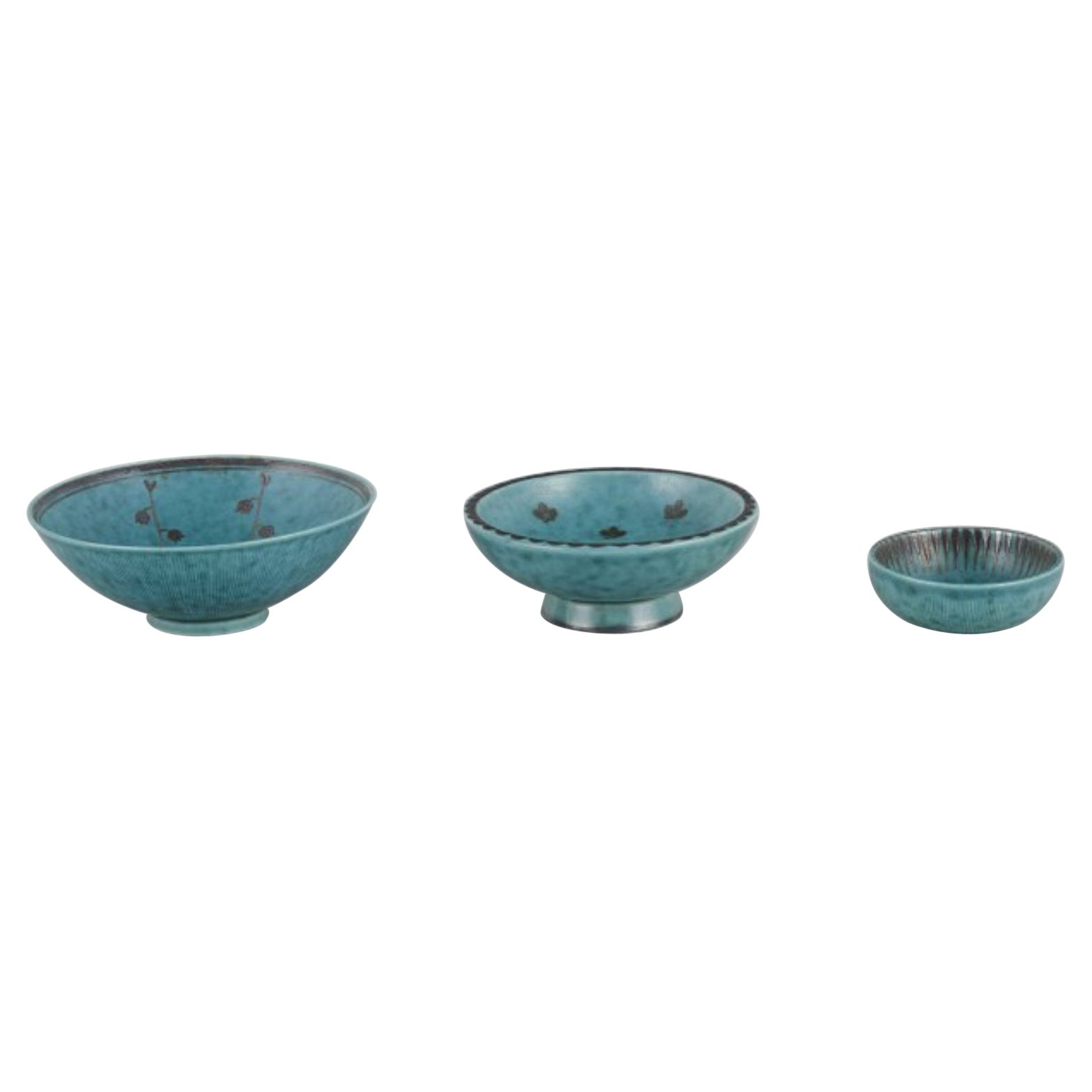 Wilhelm Kåge for Gustavsberg. Three small ceramic bowls, “Argenta" series