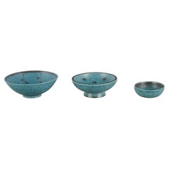 Vintage Wilhelm Kåge for Gustavsberg. Three small ceramic bowls, “Argenta" series