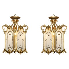 PAIR OF ANTIQUE CiRCA 1920 POLISHED BRASS HANGING LANTERNS WITH FROSTED GLASS
