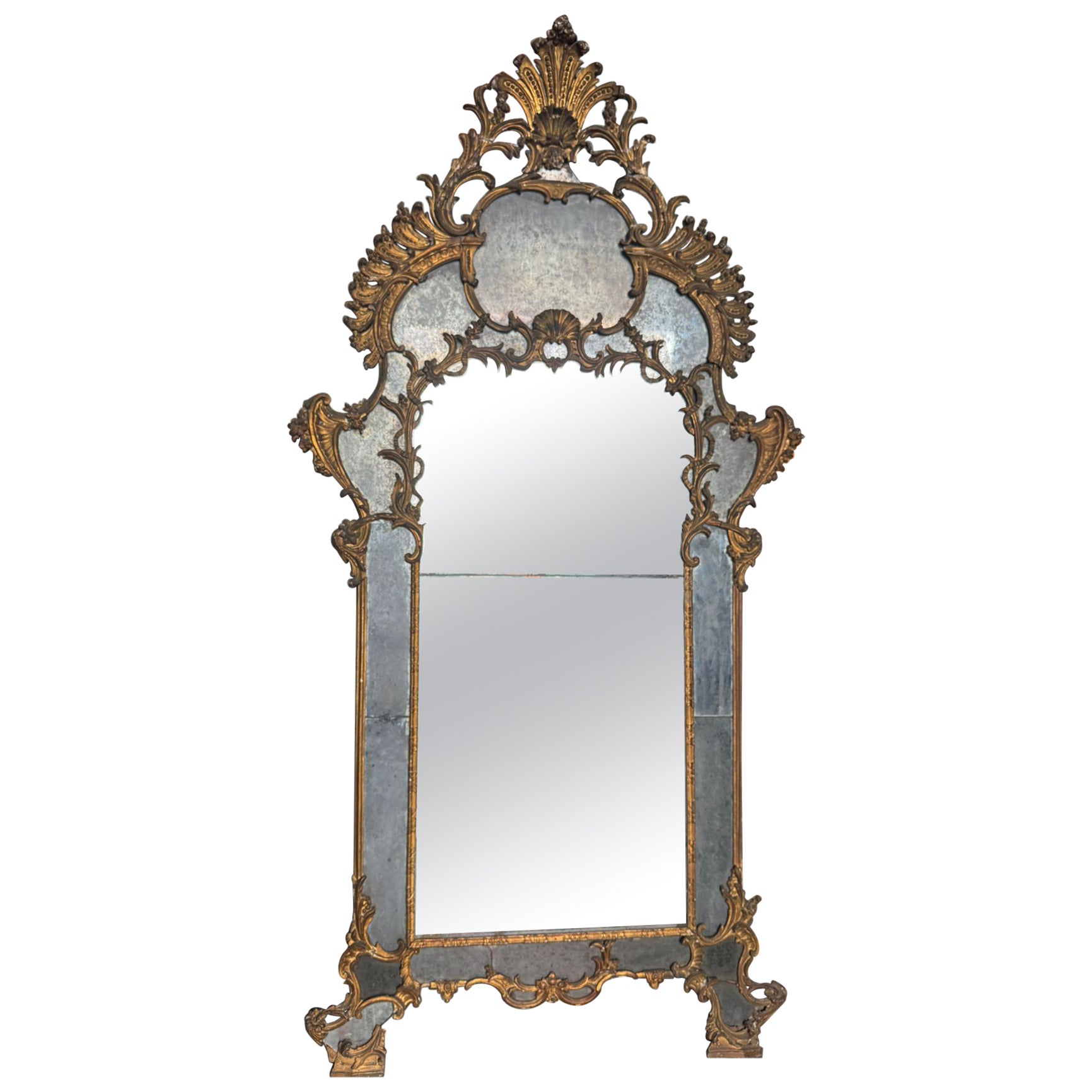 Mantelpiece mirror in richly carved and gilded wood, Italy im Angebot