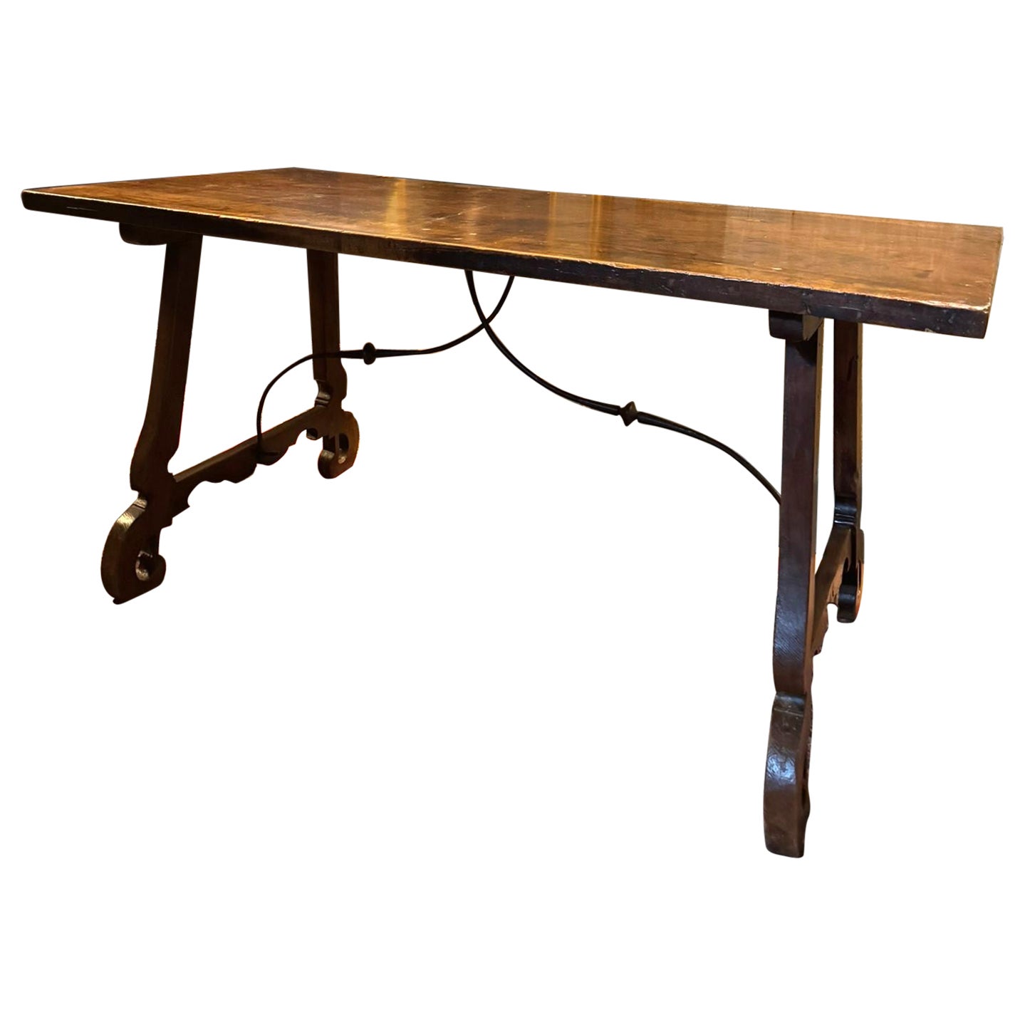 Walnut refectory table with wavy legs, Spain